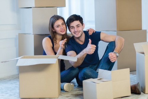 Packed boxes and furniture ready for local moving service