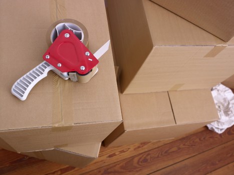 Office relocation equipment being loaded by local movers