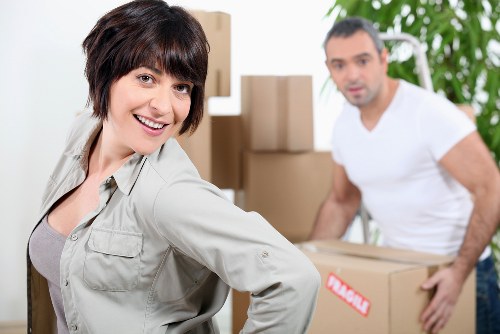 Furniture and boxes being loaded into a removals van in South London