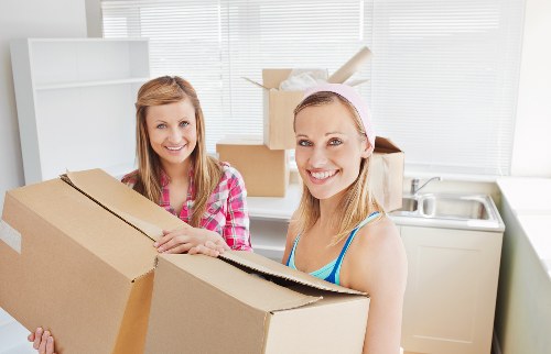 Packed boxes and furniture ready for transport