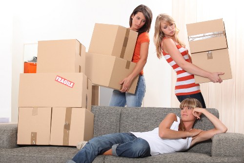 Packing and loading household items for a flat move in South London